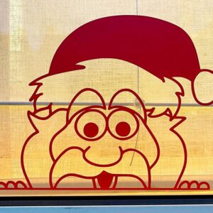 Raamsticker Gluurkerstman van 30x38 cm